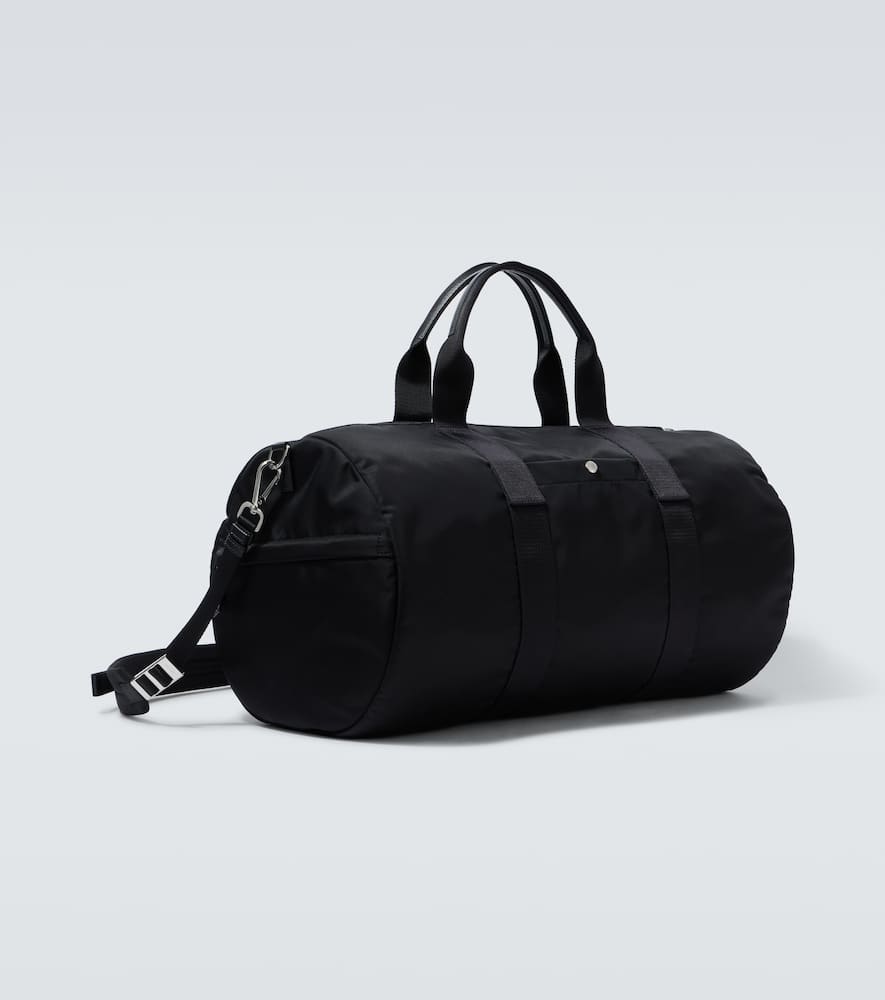 PRADA RE-NYLON LEATHER-TRIMMED DUFFEL BAG
