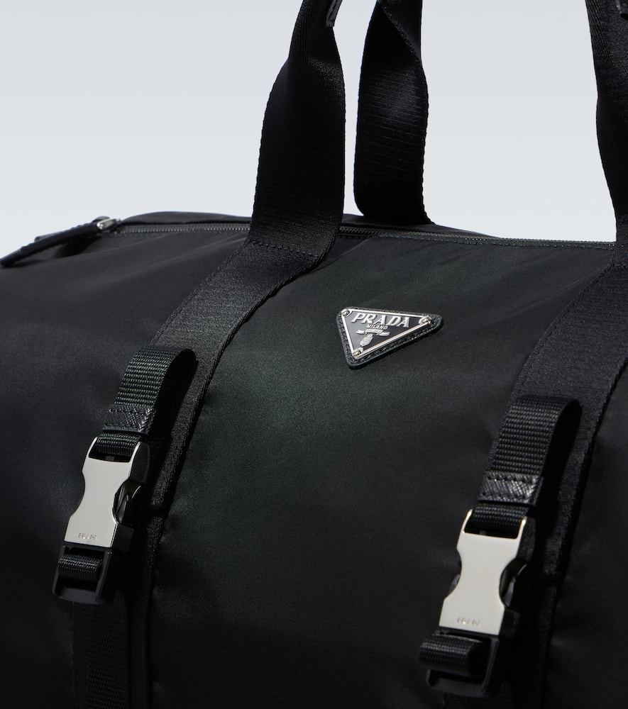 PRADA RE-NYLON LEATHER-TRIMMED DUFFEL BAG