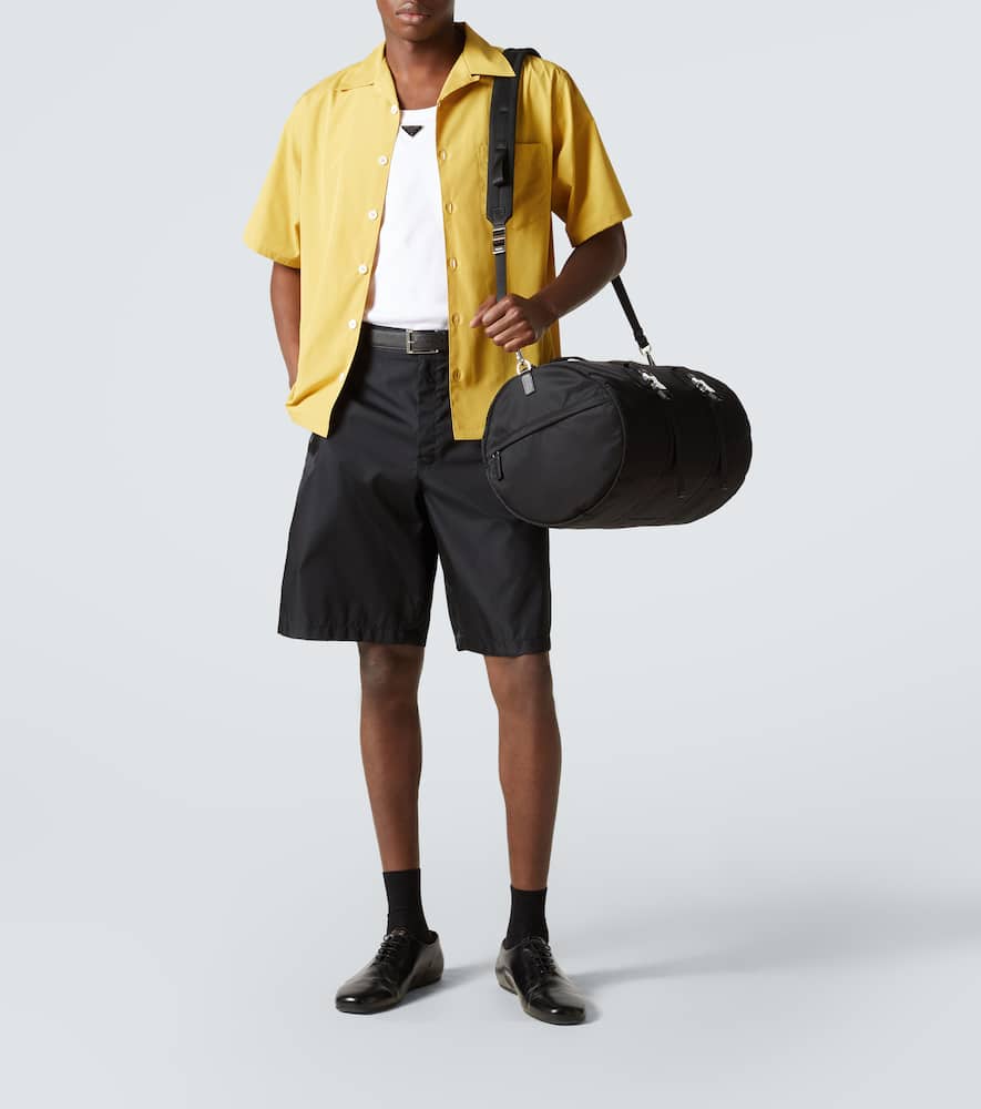 PRADA RE-NYLON LEATHER-TRIMMED DUFFEL BAG