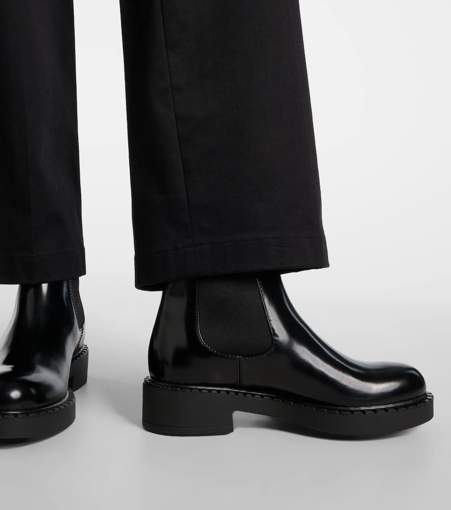 Prada Triangle-logo Chelsea Leather Boots In Black