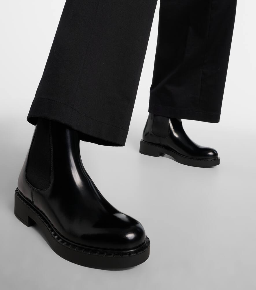 Prada Triangle-logo Chelsea Leather Boots In Black