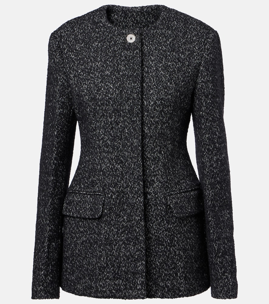 Toteme Blazer en tweed 534 €