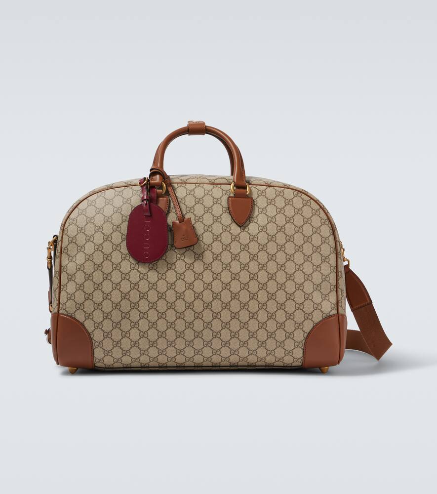 Gucci GG Canvas Medium leather-trimmed duffel bag