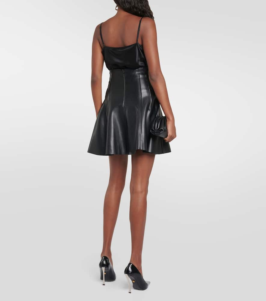 Shop Norma Kamali Grace Faux Leather Miniskirt In Black