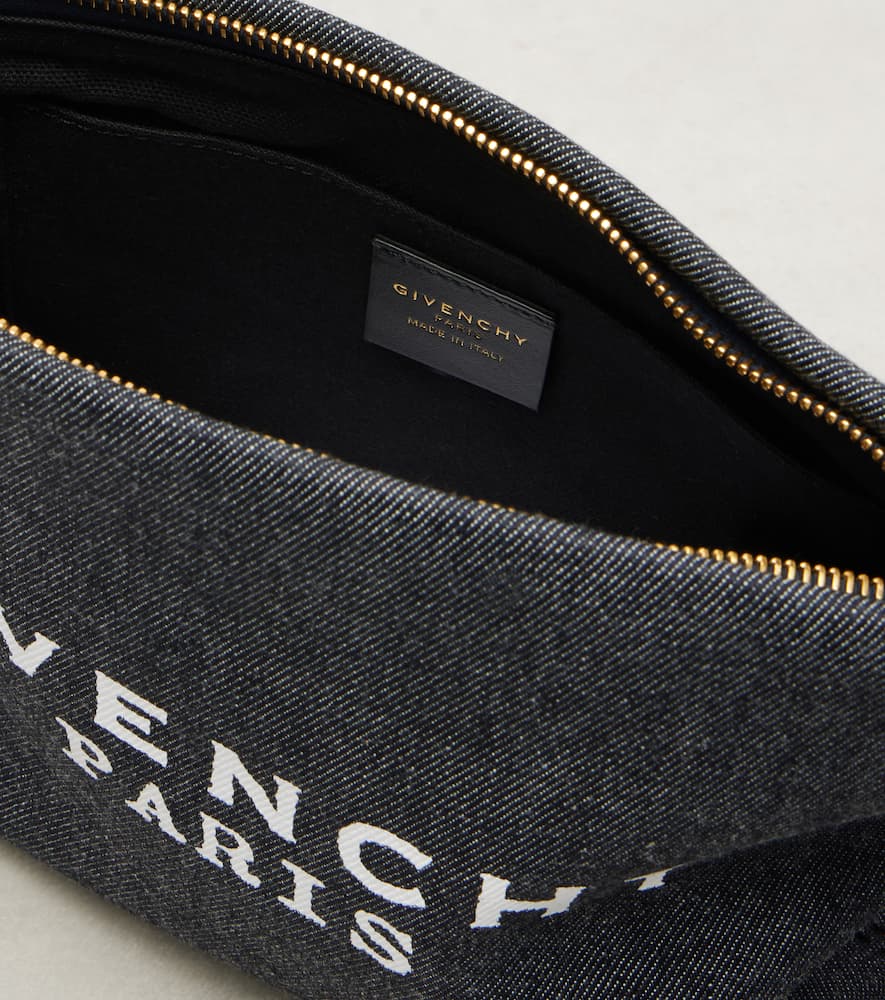 Givenchy Paris Logo Printed Zipped Clutch Bag In Black