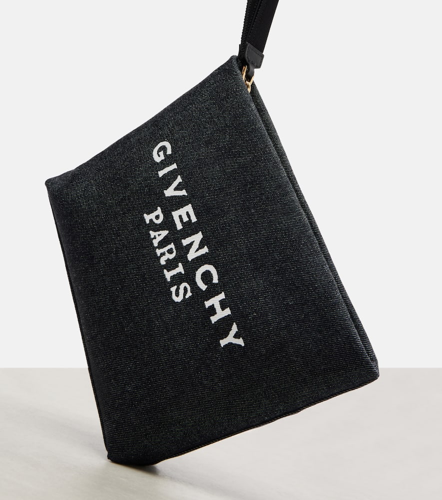 Givenchy Paris Logo Printed Zipped Clutch Bag In Black