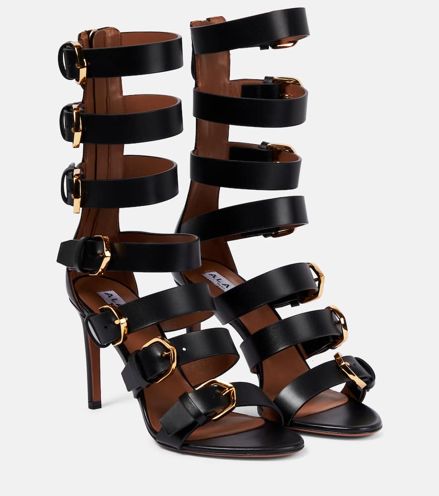 Shop Alaïa Buckle Leather Sandals In Black