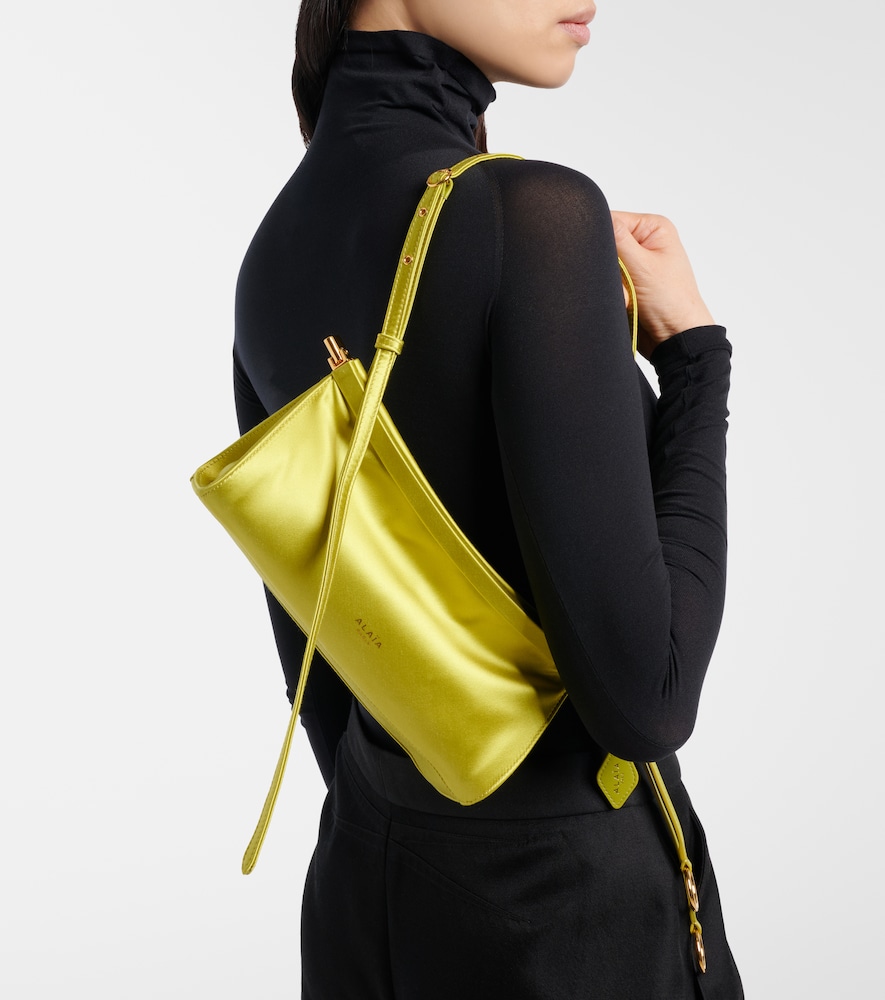 Alaïa Le Click East West Small leather-trimmed satin shoulder bag
