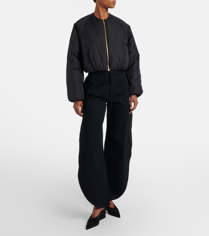 Alaïa Faded barrel-leg jeans