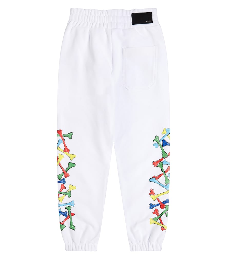 Shop Amiri Printed Cotton Sweatpants In White