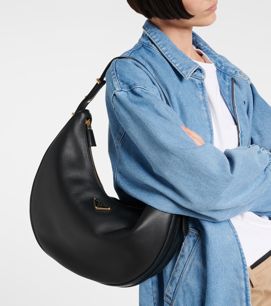 Prada Rounded Shoulder Bag With Gold-tone Hardware In Black