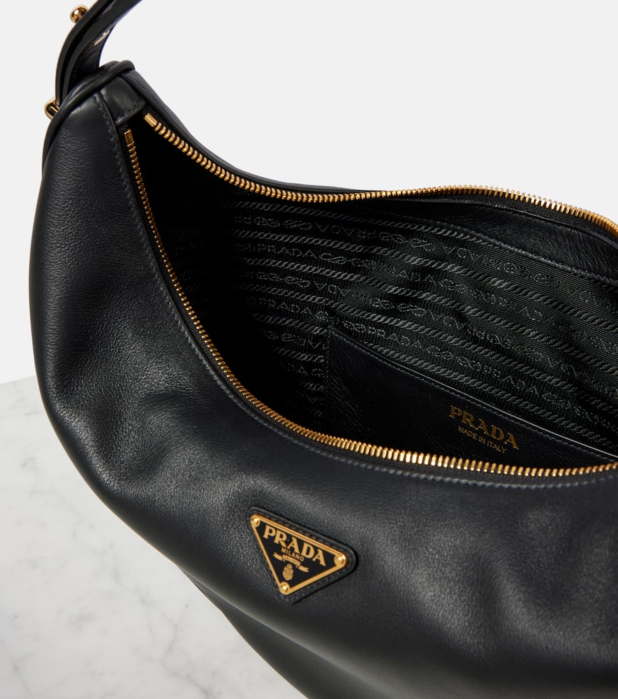 Prada Rounded Shoulder Bag With Gold-tone Hardware In Black