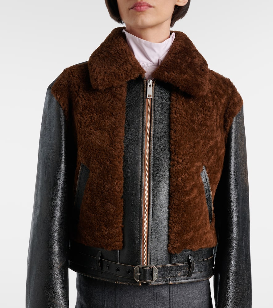Prada Belted shearling-trimmed leather jacket