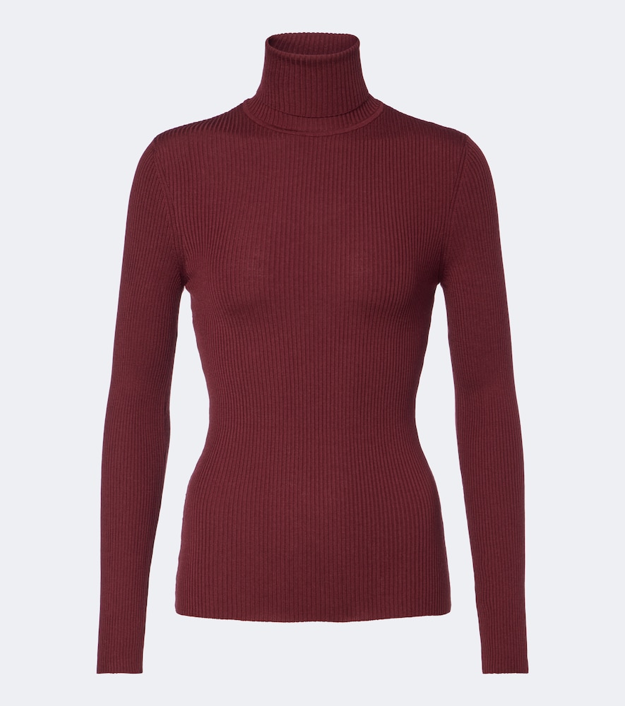 Wolford Top col roul en laine vierge 375€