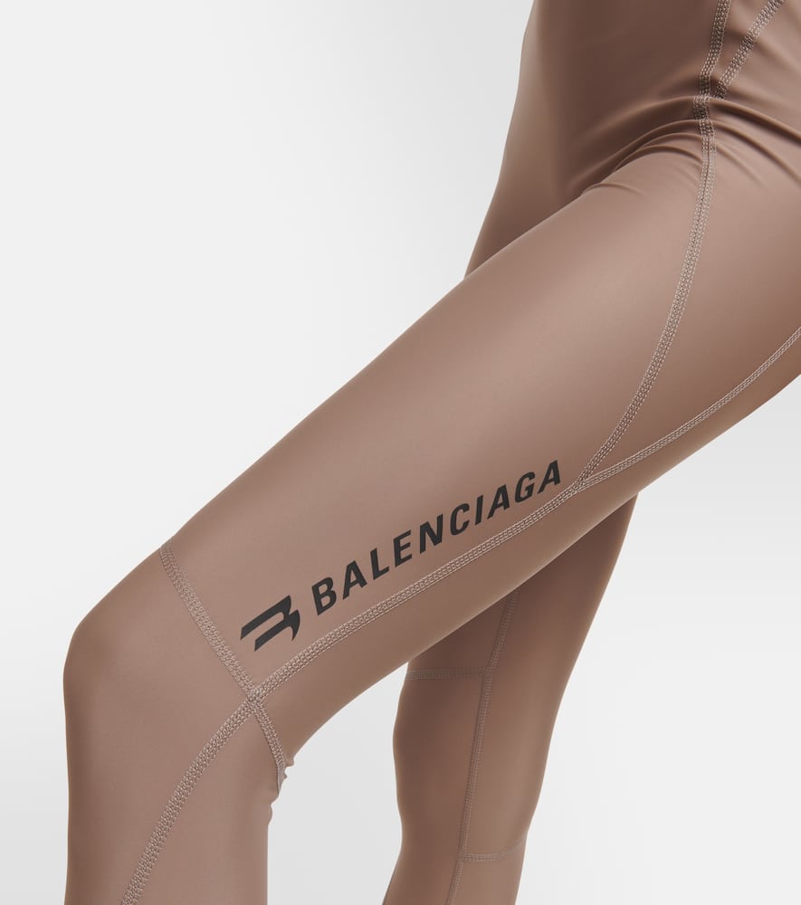 Shop Balenciaga Logo Jumpsuit In Beige