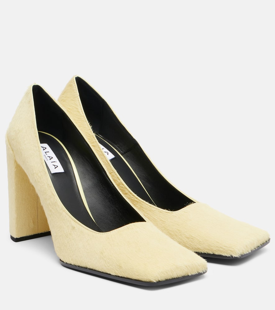 Alaïa 90 Calf Hair Pumps In Yellow