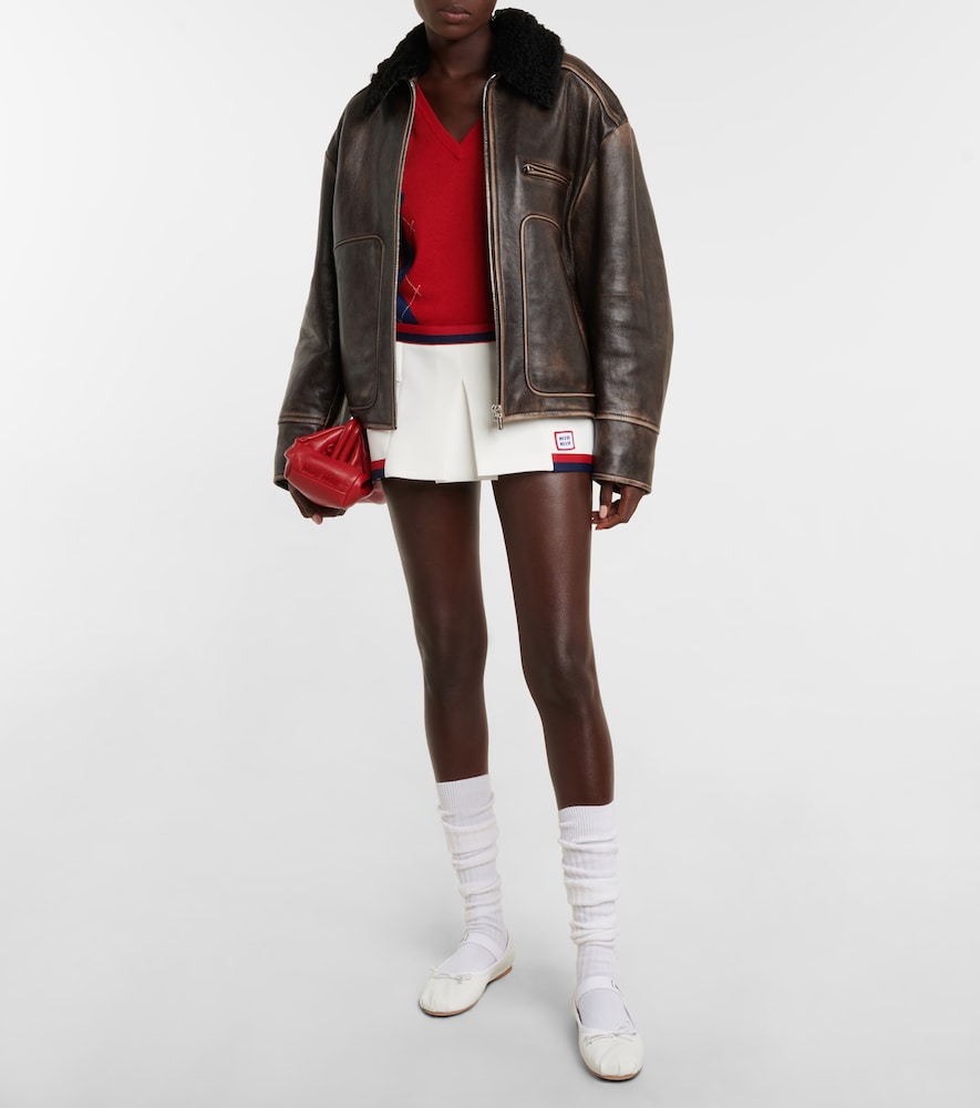 Miu Miu Low-rise jersey miniskirt