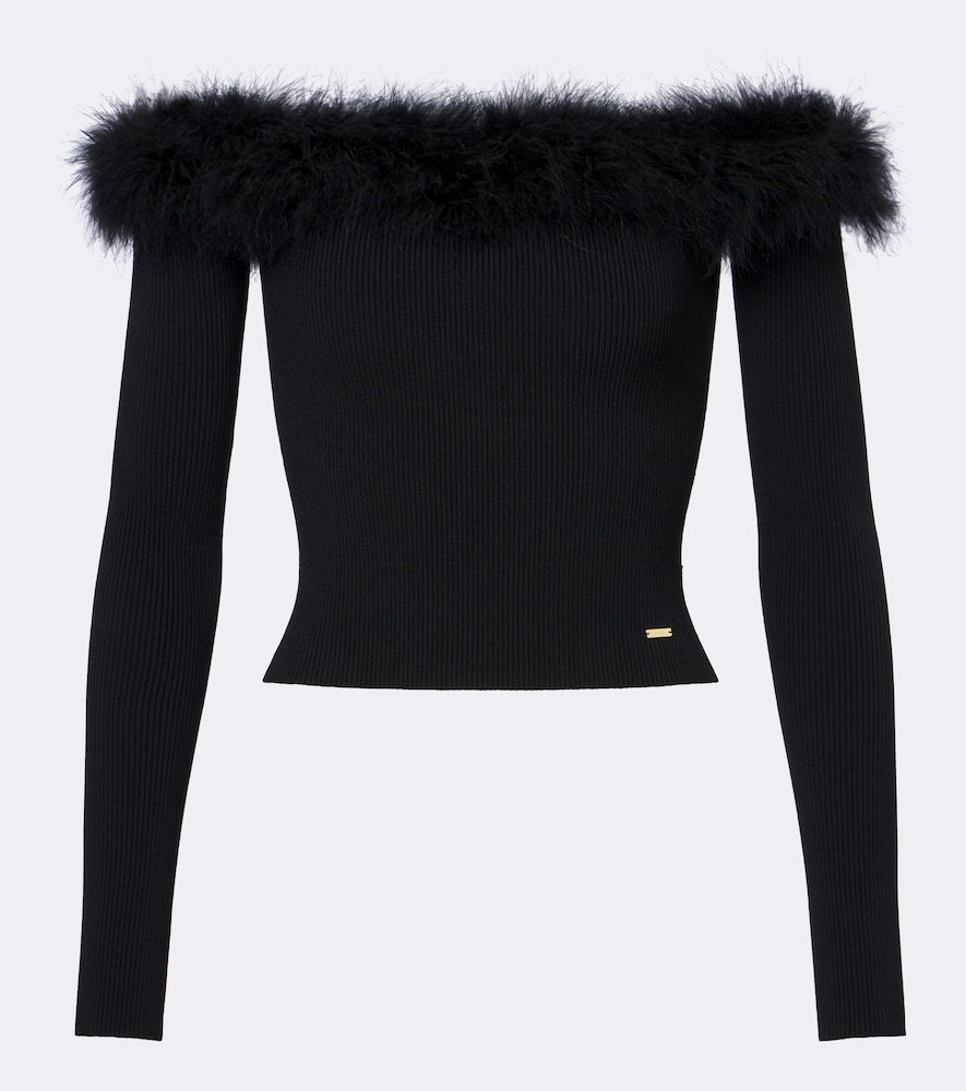 Gucci Top plumes 1700 €