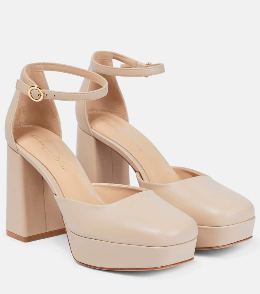 Vernice platform leather pumps