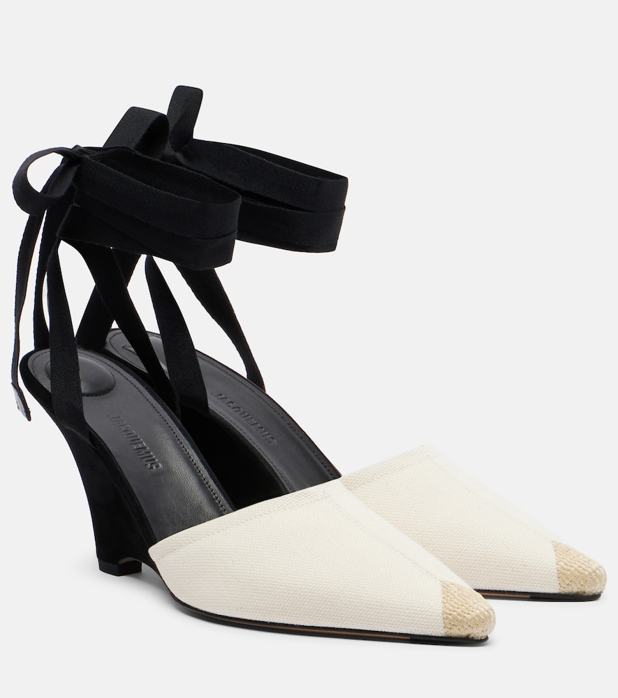 Jacquemus Escarpins compenss en toile 450 €