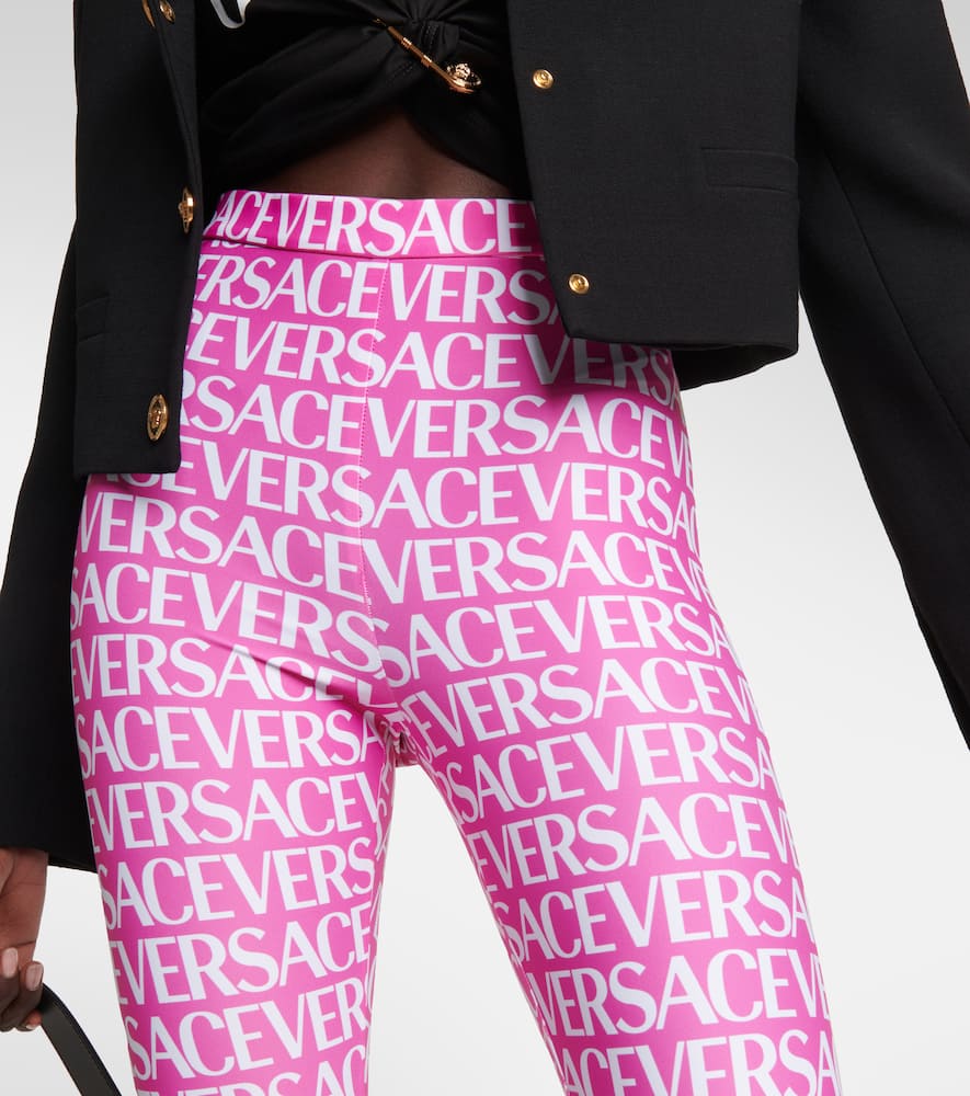 Shop Versace Logo Printed Leggings In Pink+white