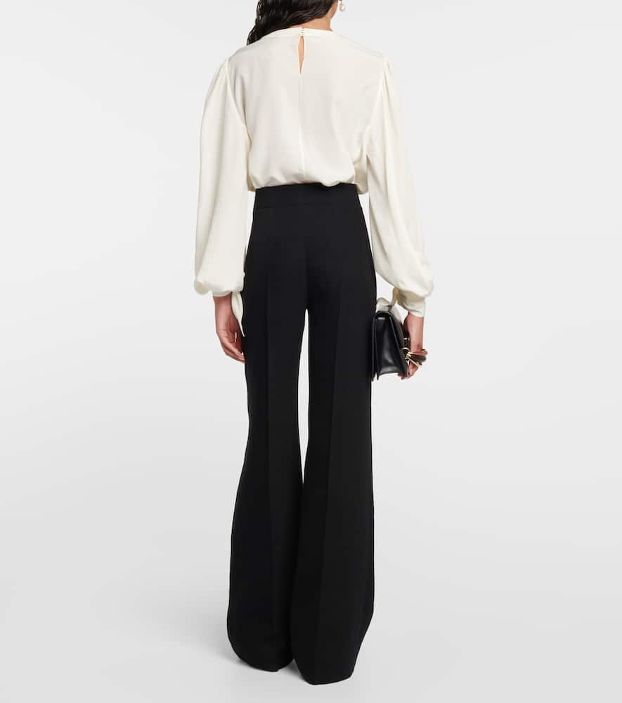 Chloé Flared Wool Trousers Asymmetrical Hems In Black