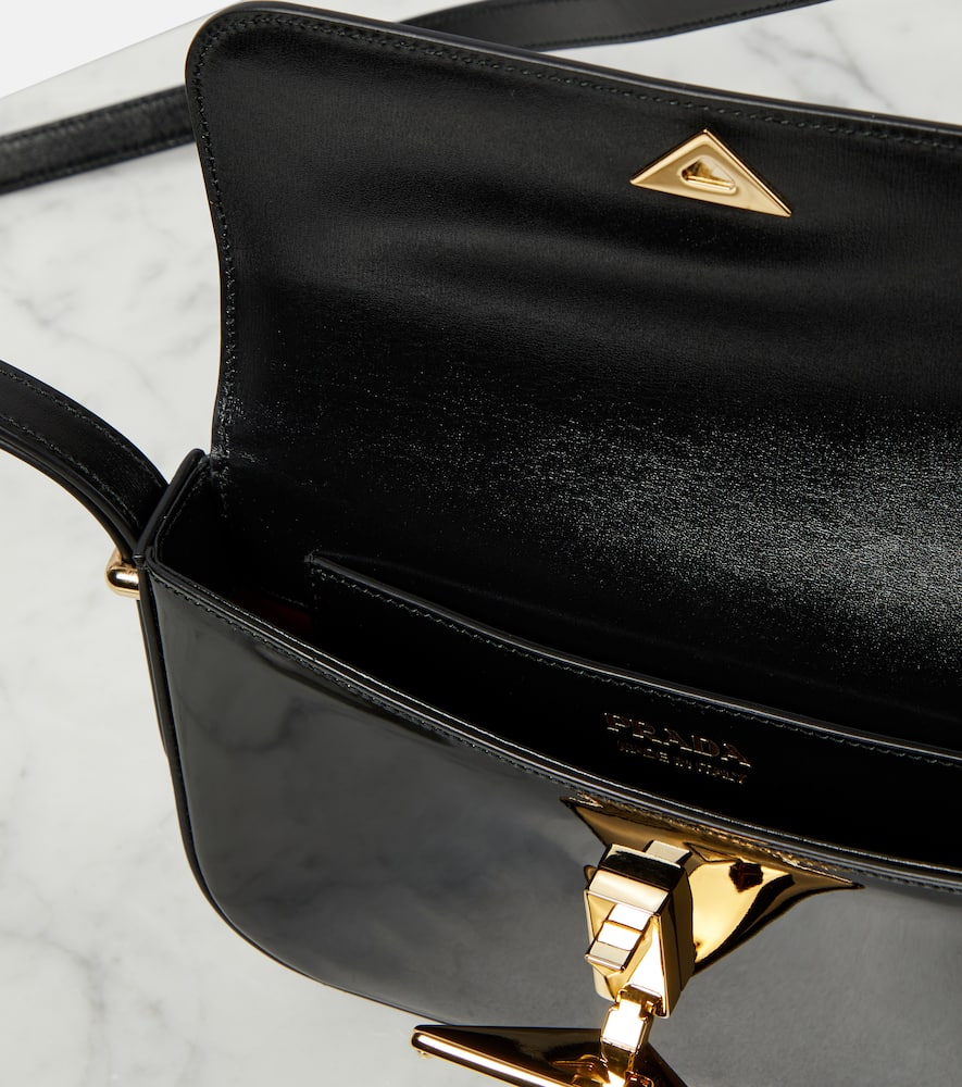 Prada Logo Patent Leather Shoulder Bag In Black