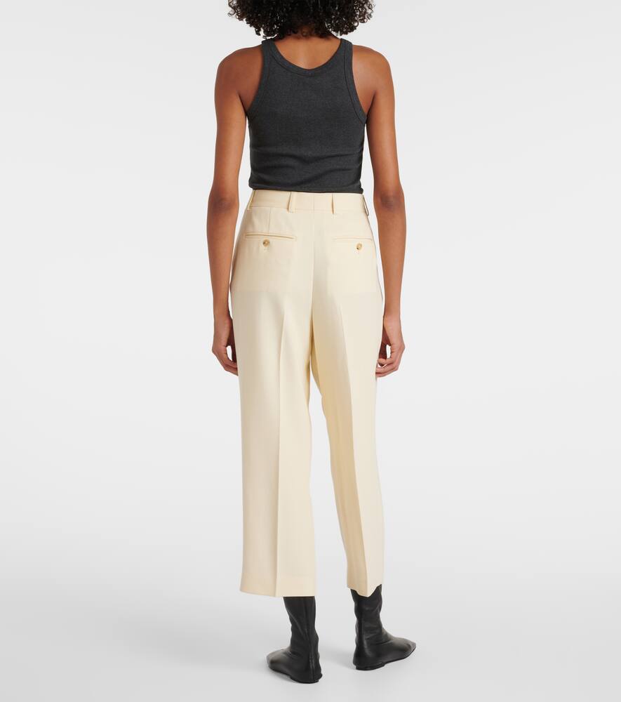 Totême Pleated Low-rise Straight Pants In Yellow