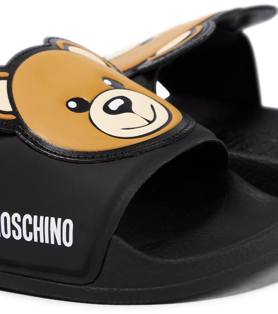 Shop Moschino Logo Rubber Slides In Black