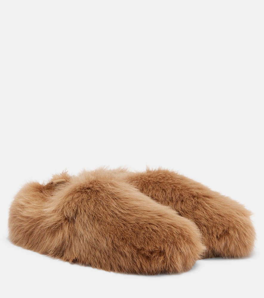 Tods Slippers Gommino en shearling 840 €