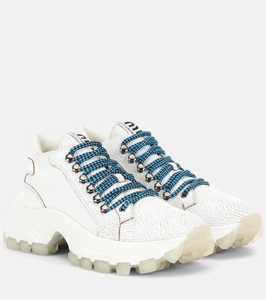 Click to view more detailed imagery on our partner's website Miu Miu White Leather Sneakers