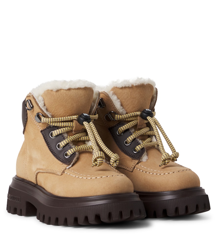 Stivaletti stringati in pelle con shearling