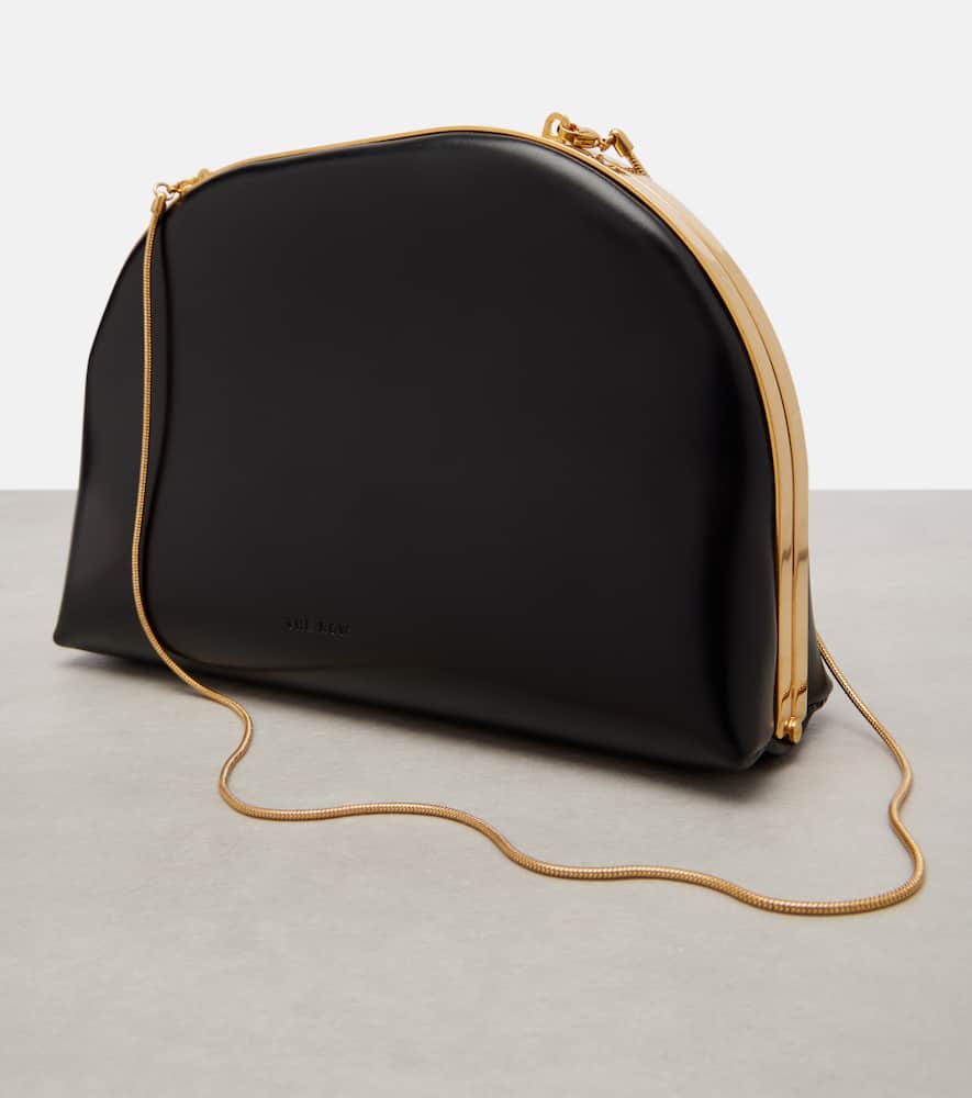 The Row Sylvia Leather Clutch In Black