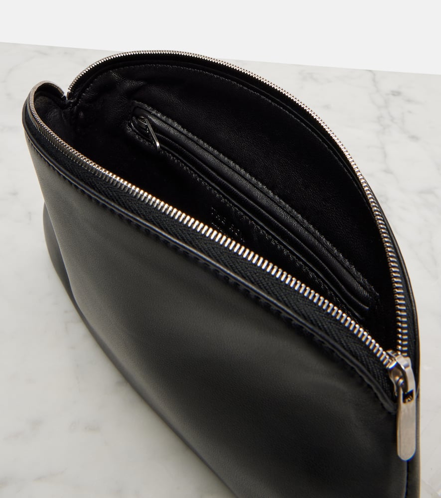 The Row Round Leather Coin Purse In Black
