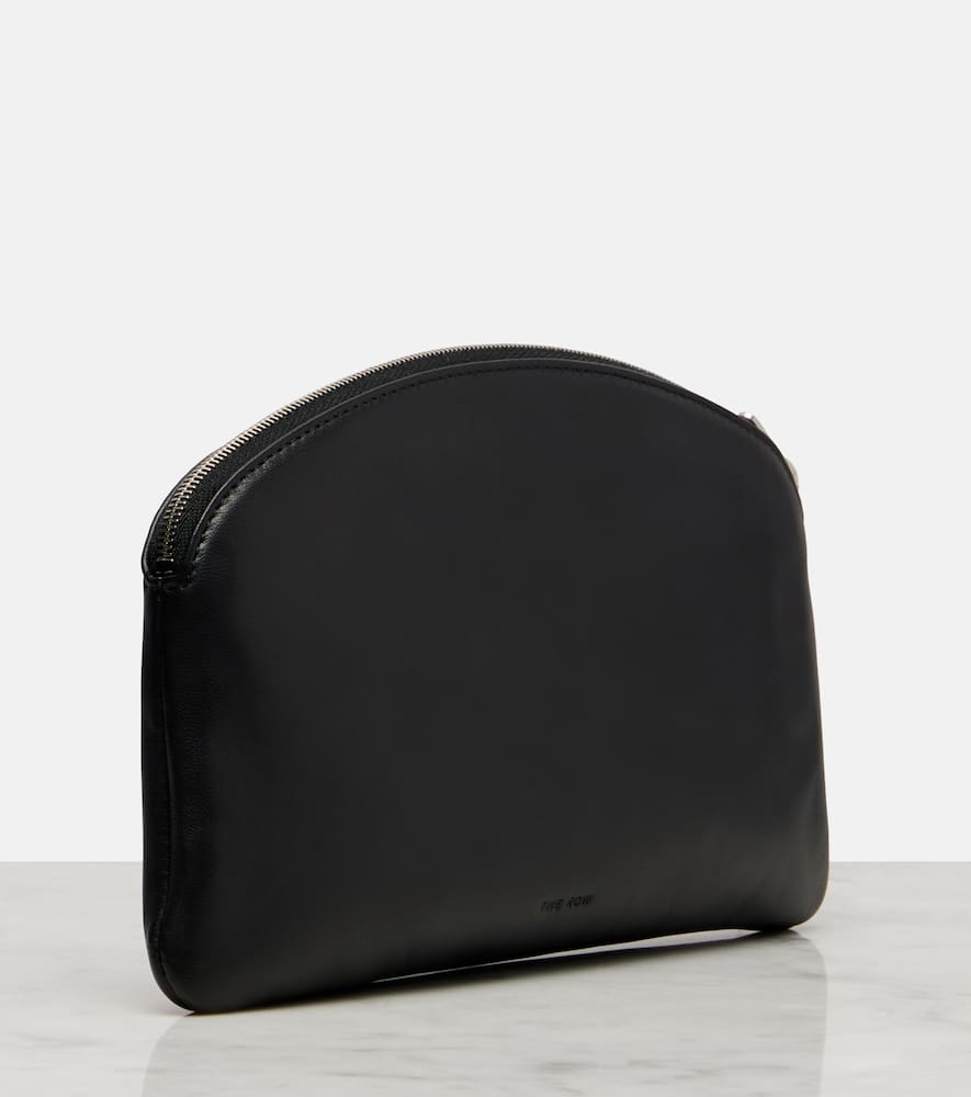 The Row Round Leather Coin Purse In Black