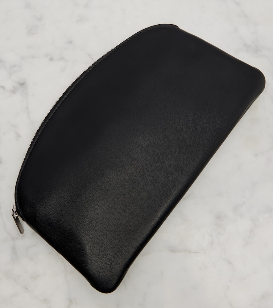 The Row Round Leather Coin Purse In Black