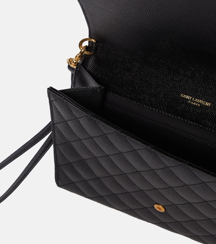 Shop Saint Laurent Envelope Matelassé Leather Clutch In Black