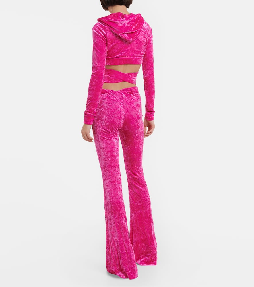 Shop Versace Flared Velvet Pants In Glossy Pink