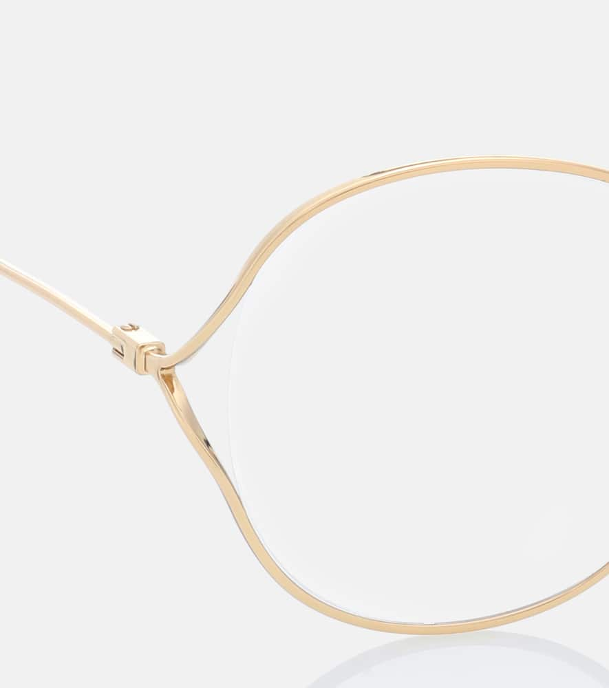 Shop Gucci Round Glasses In Gold