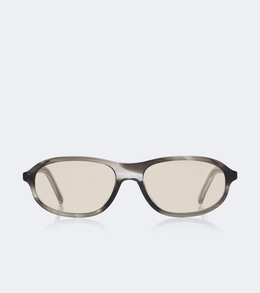 Prada Iconic Plaque Oval Sunglasses In Gray