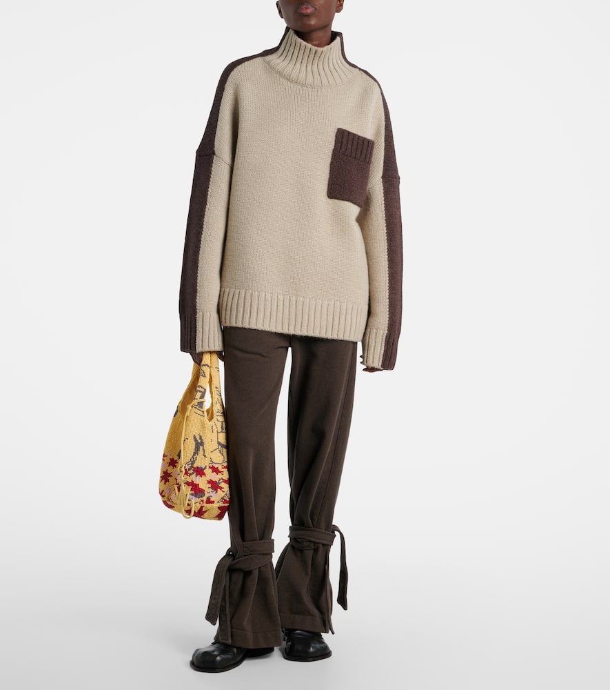 Jw Anderson Tapered Cotton Fleece Sweatpants In Brown