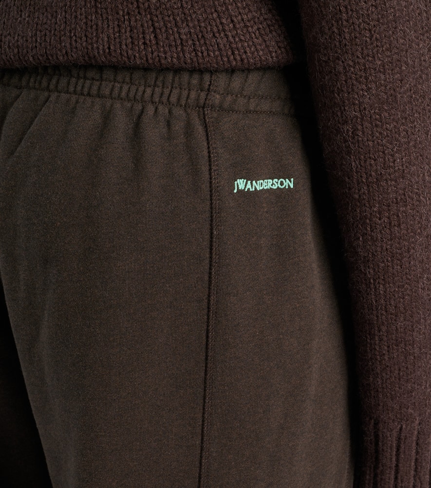 Jw Anderson Tapered Cotton Fleece Sweatpants In Brown