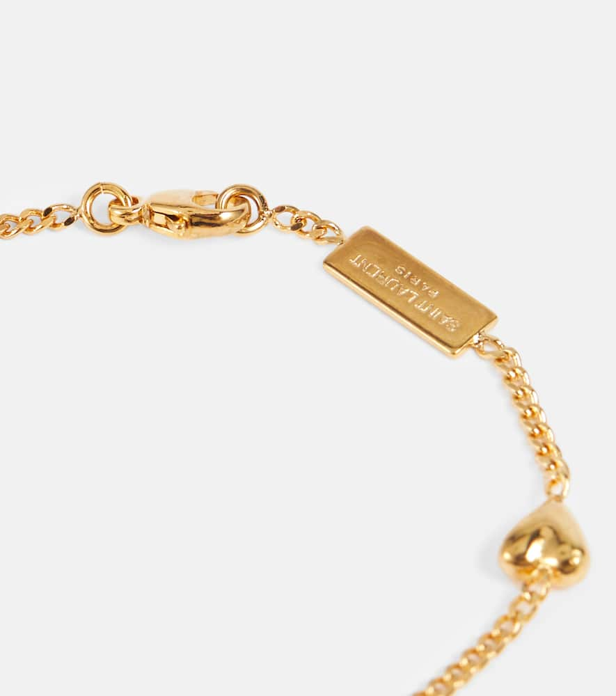 Shop Saint Laurent Opyum Heart Charm Bracelet In Or Laiton Vieilli/cr