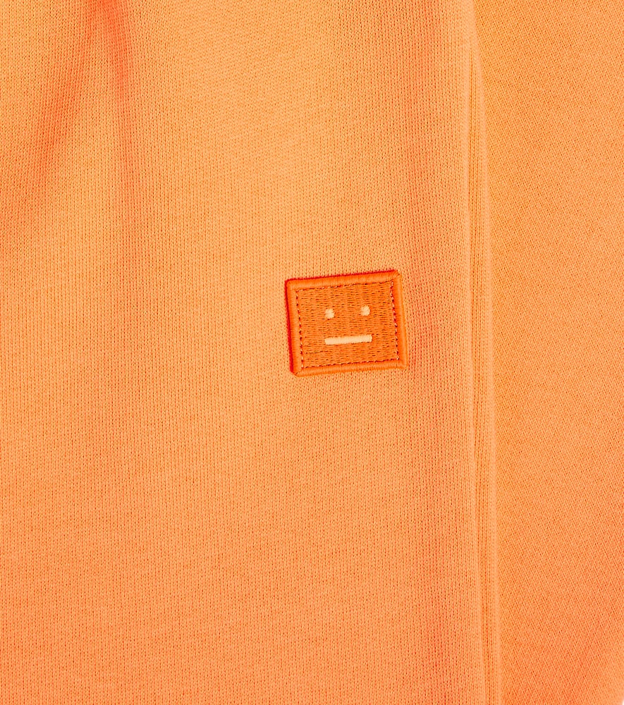 Acne Studios Face Logo Cotton Jersey Sweatpants In Orange