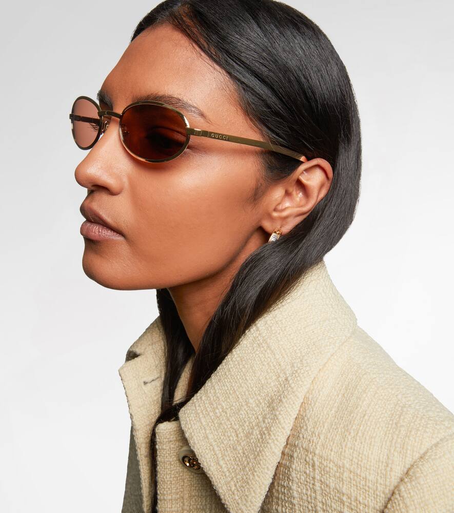 Gucci Rodeo Drive Oval Sunglasses In Gold