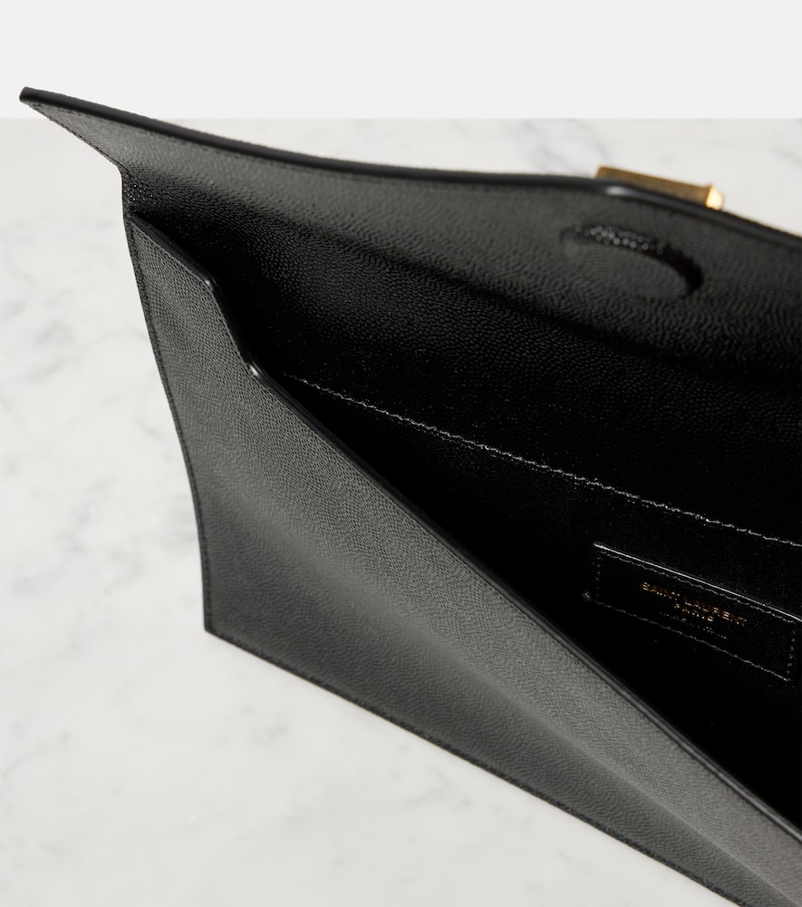 Shop Saint Laurent Uptown Leather Clutch In Black