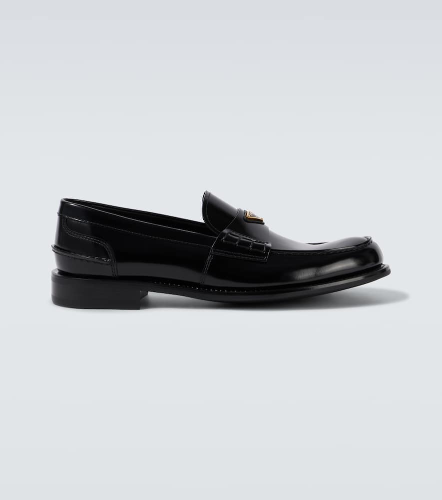 Prada Triangular Plaque Loafers In Black