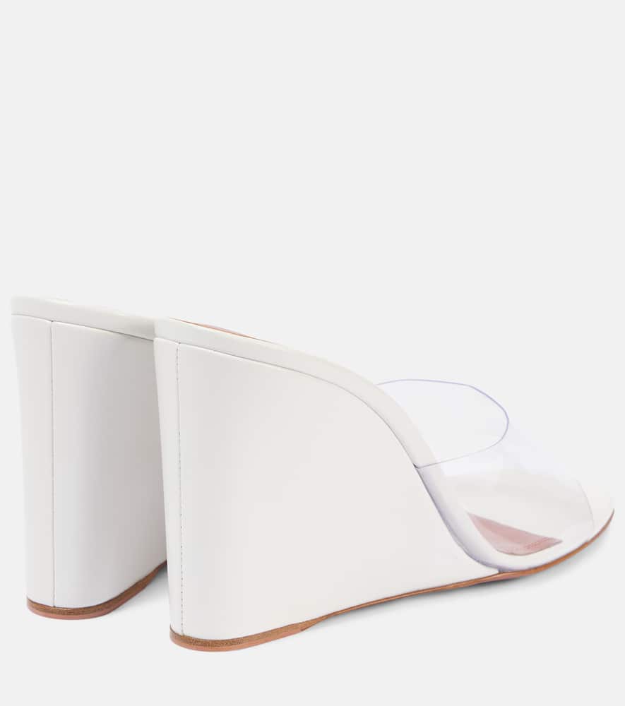 Shop Amina Muaddi Lupita Half Glass Pvc And Leather Wedge Mules In Transparent