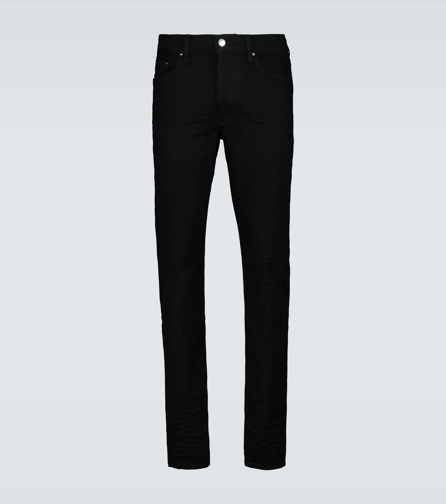 Click to view more detailed imagery on our partner's website Amiri 'slash' Distressed Knee Skinny Jeans In Black