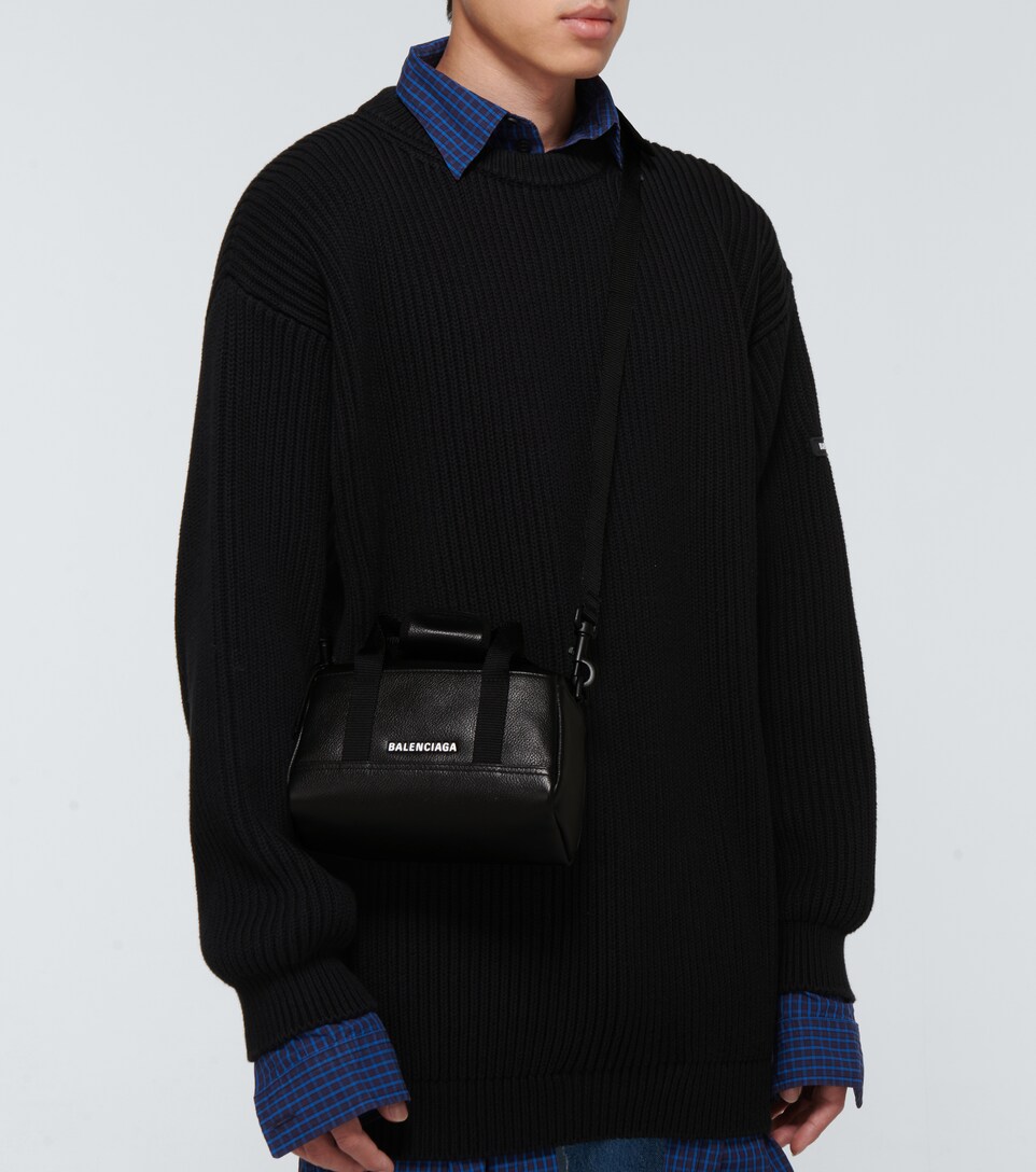 black small duffle bag